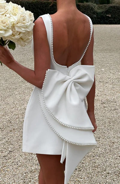 NuMode | Women's Pearl Bow Back Mini Dress