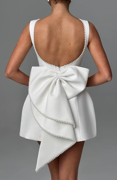 NuMode | Women's Pearl Bow Back Mini Dress