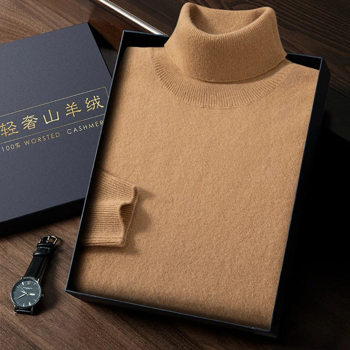 Brown turtleneck sweater in a box with a watch on a wooden surface