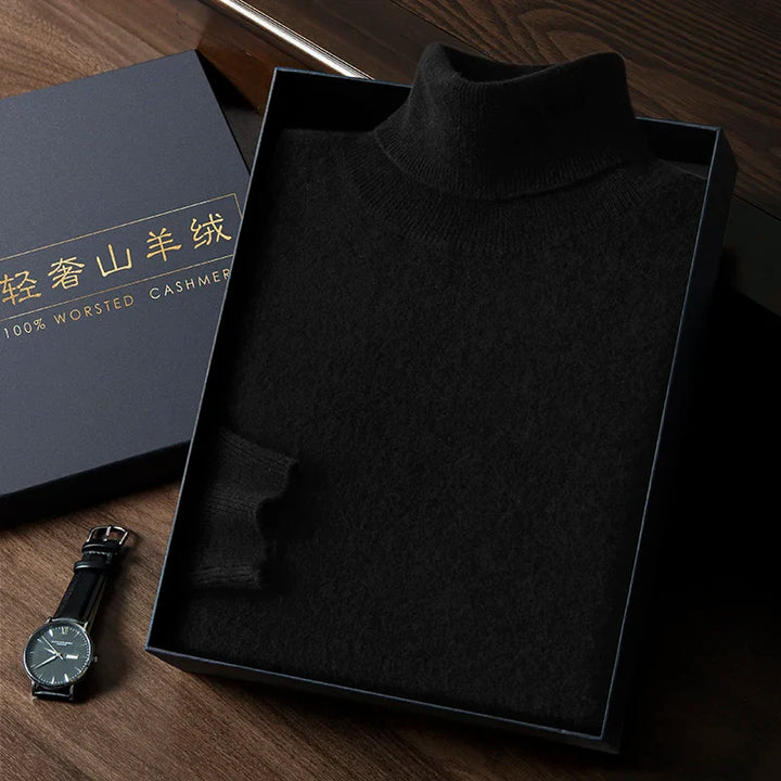 Black turtleneck sweater in a box with a watch on a wooden surface