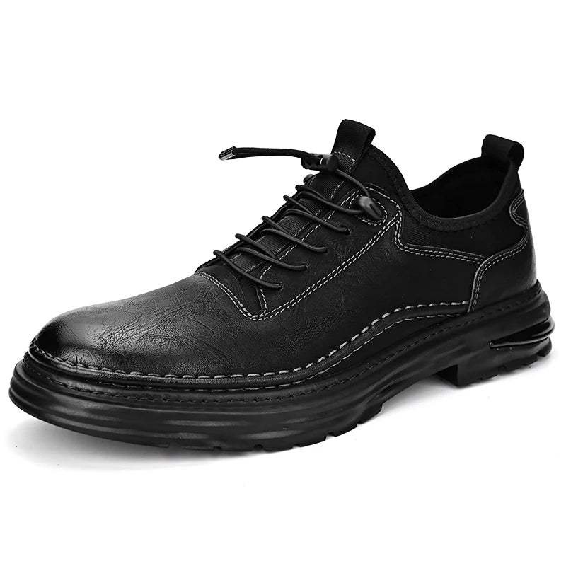 Black leather shoe on a white background