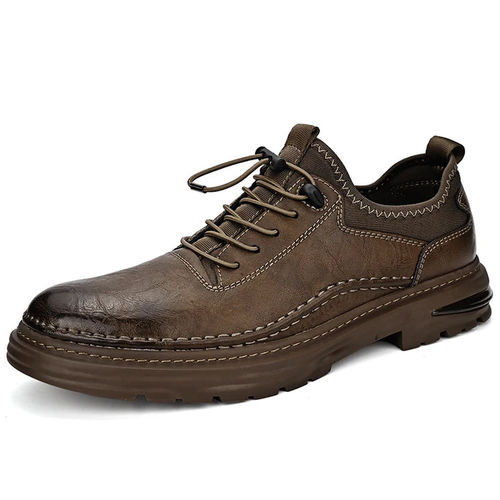 Brown leather shoe with laces on a white background
