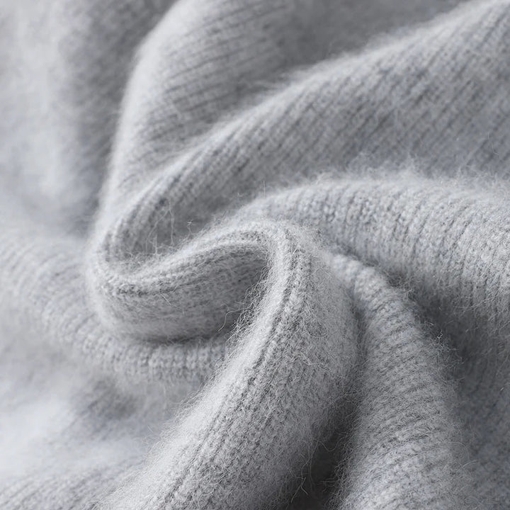 Close-up of gray knitted fabric with a soft texture