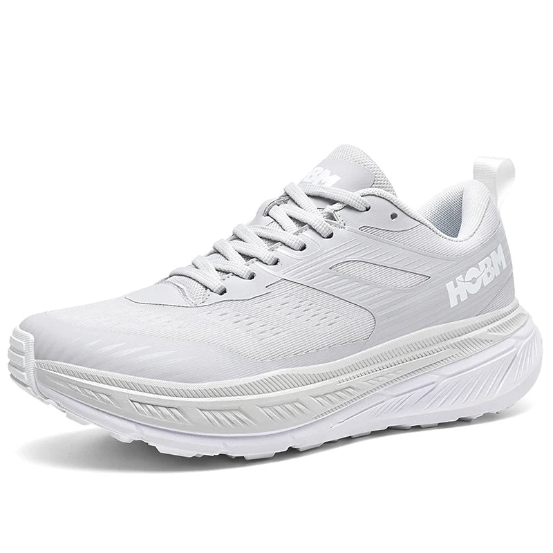 White running shoe with 'HOKA' branding on a white background
