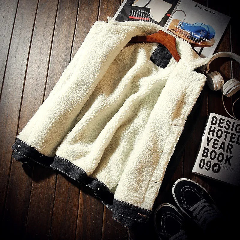 White fleece vest on a wooden floor with a magazine and shoes in the background