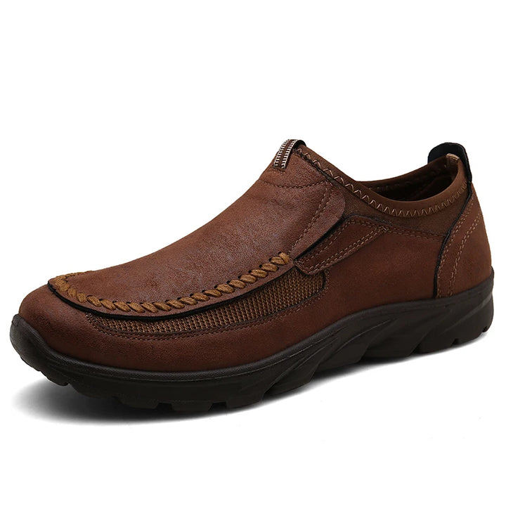 Brown leather shoe on a white background