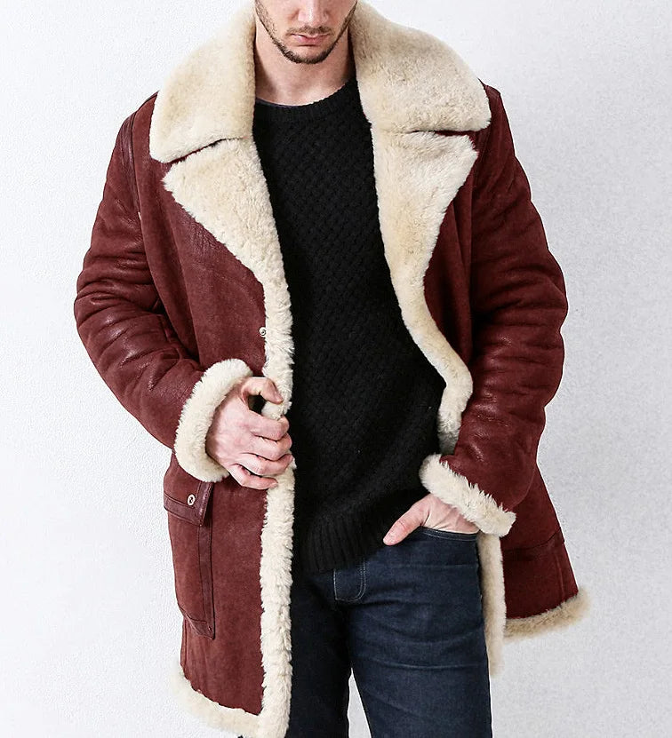 Man wearing a brown shearling coat with white fur lining on a white background
