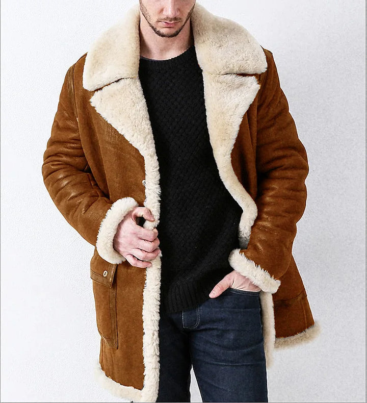 Man wearing a brown shearling coat with white fur lining on a white background