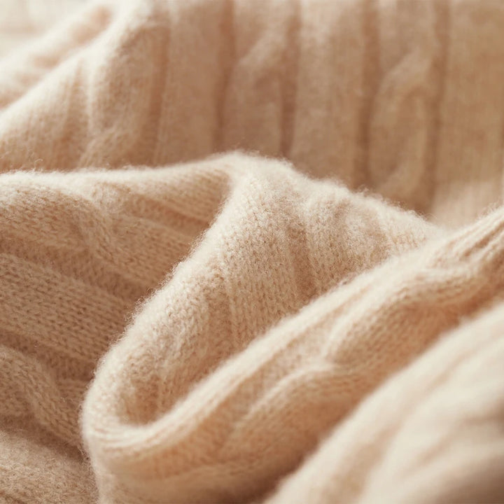 Close-up of beige knitted fabric