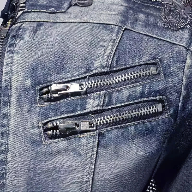 Close-up of blue denim jeans with zippers on the pockets