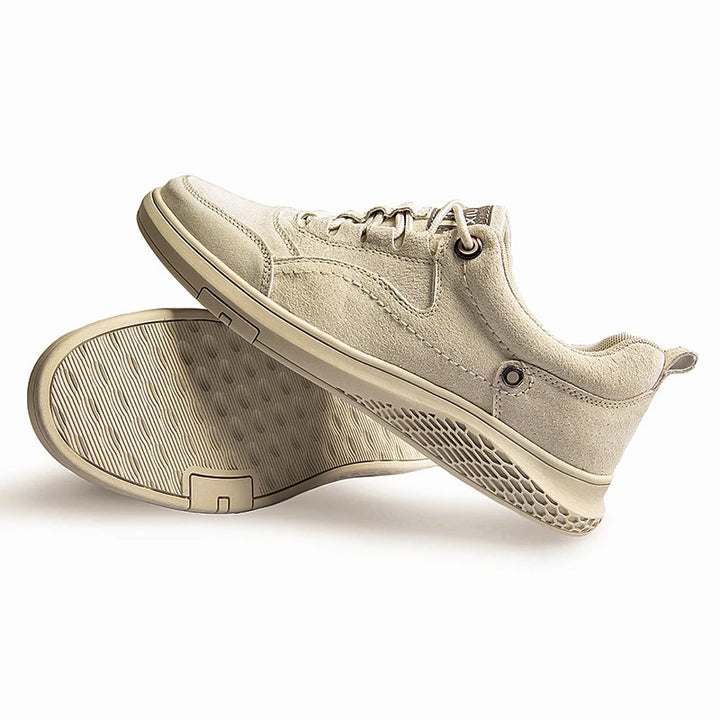 Beige casual sneakers on a white background