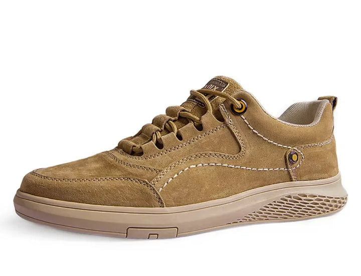 Tan sneaker on a white background