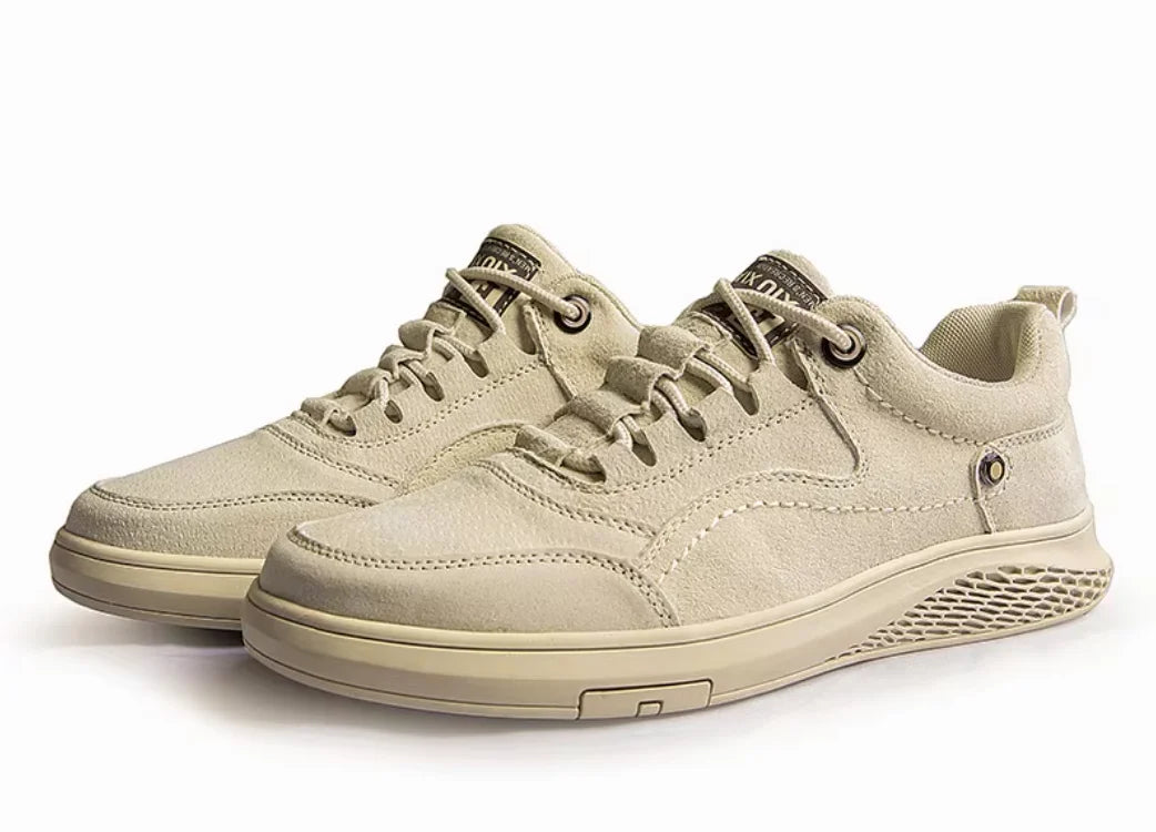 Beige casual shoes on a white background