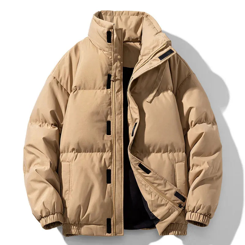 Beige puffer jacket on a light gray background