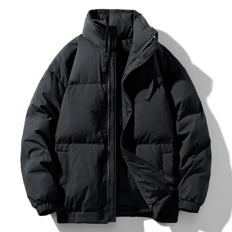 Black puffer jacket on a white background