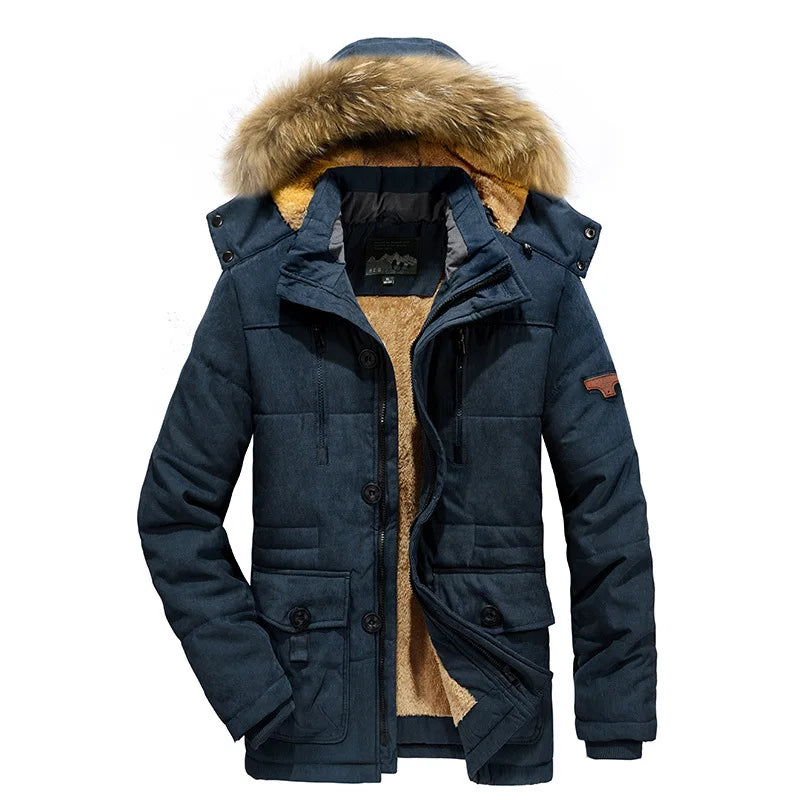 Blue winter coat with fur-lined hood on a white background