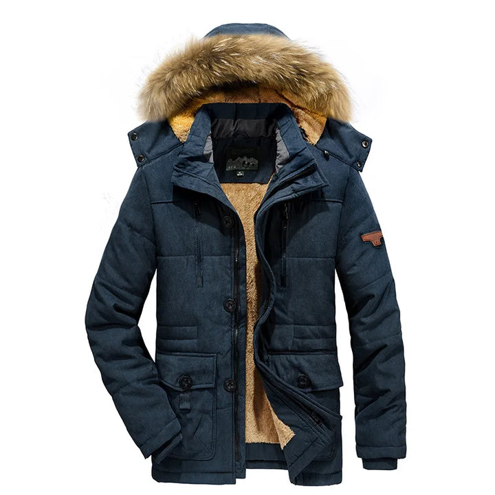 Blue winter coat with fur-lined hood on a white background