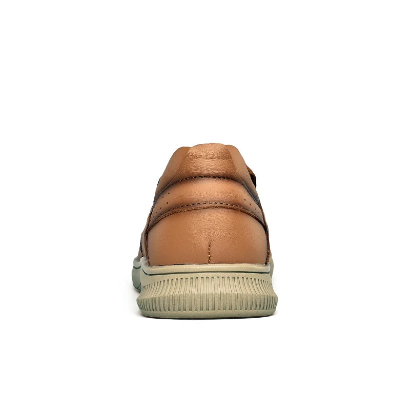 Brown leather shoe with a white sole on a white background