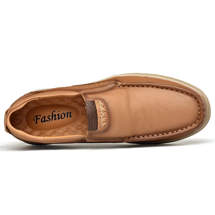 Tan slip-on shoe with 'Fashion' branding on a white background