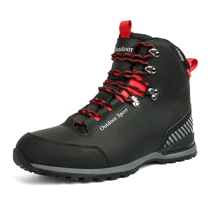 Black hiking boot with red laces on a white background