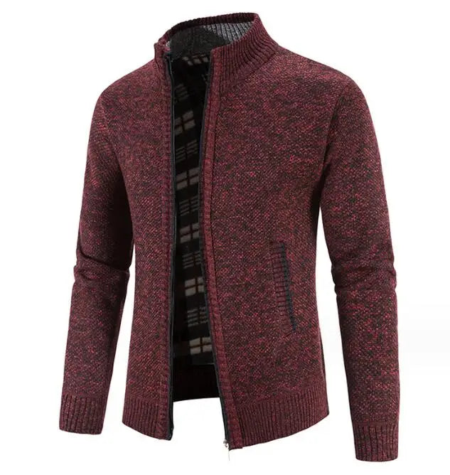 Maroon knitted cardigan on a white background