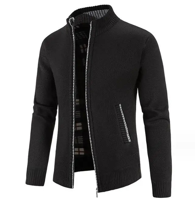 Black zip-up sweater on a white background