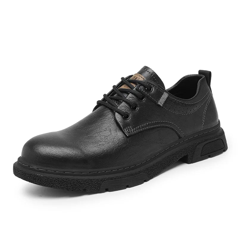 Black leather shoe on a white background