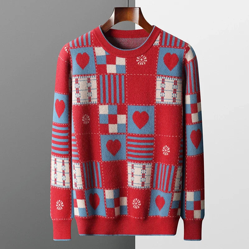 Red patchwork sweater with heart designs on a grey background