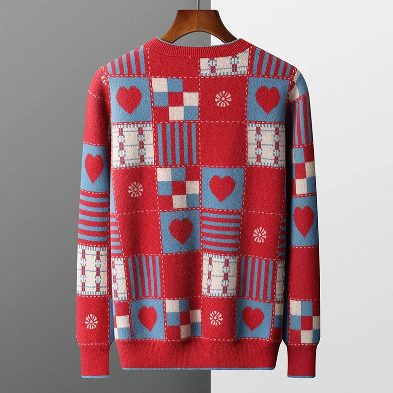 Red sweater with patchwork pattern and heart designs on a gray background