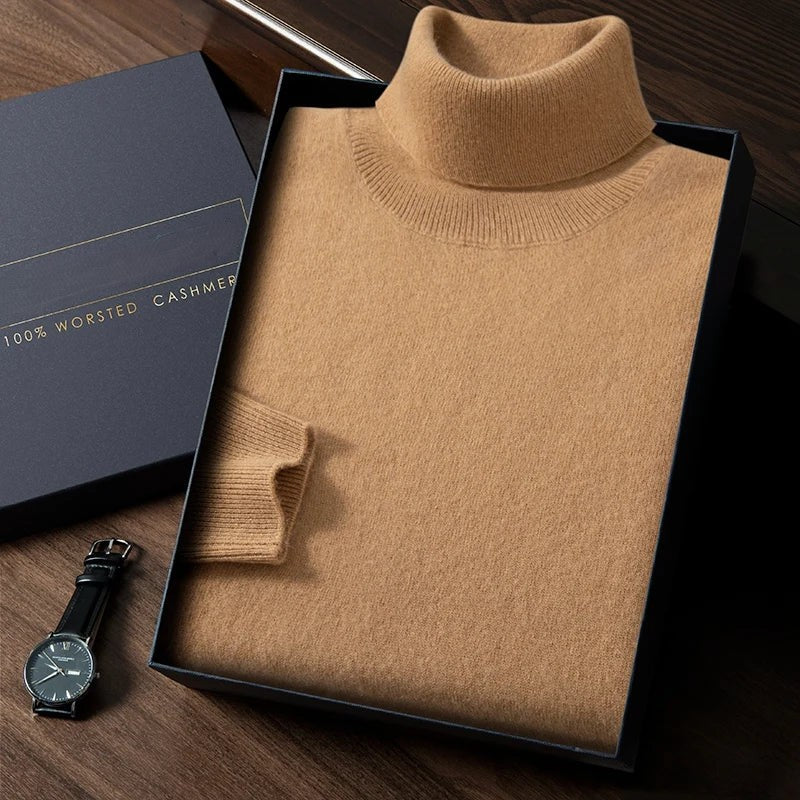 Brown turtleneck sweater in a box with a watch on a wooden surface