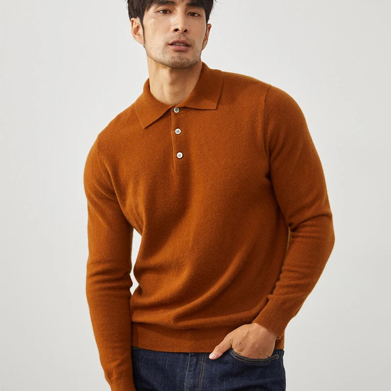 Man wearing a brown sweater with a collar on a light gray background