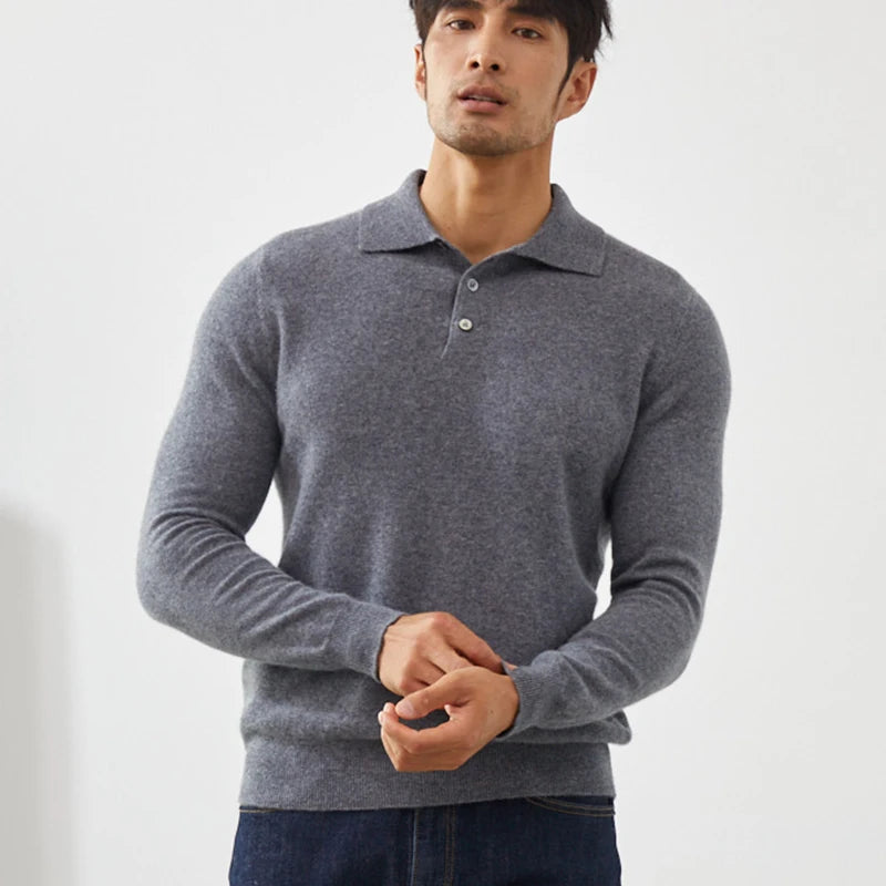 Man wearing a gray long-sleeve polo shirt against a white background