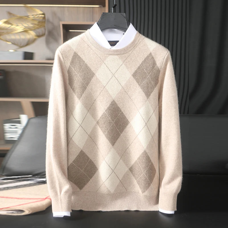 Beige argyle sweater on a hanger with a blurred background