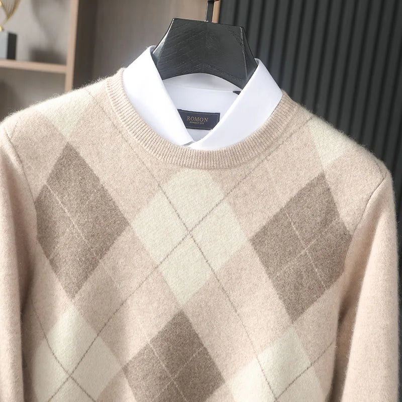 Beige argyle sweater on a mannequin with a blurred background