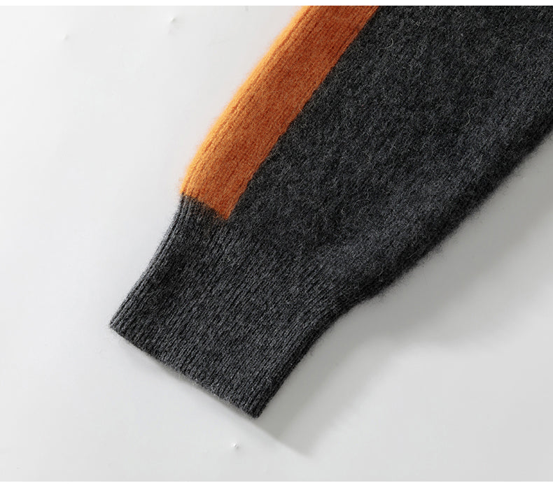 Close-up of a gray and orange sock on a white background