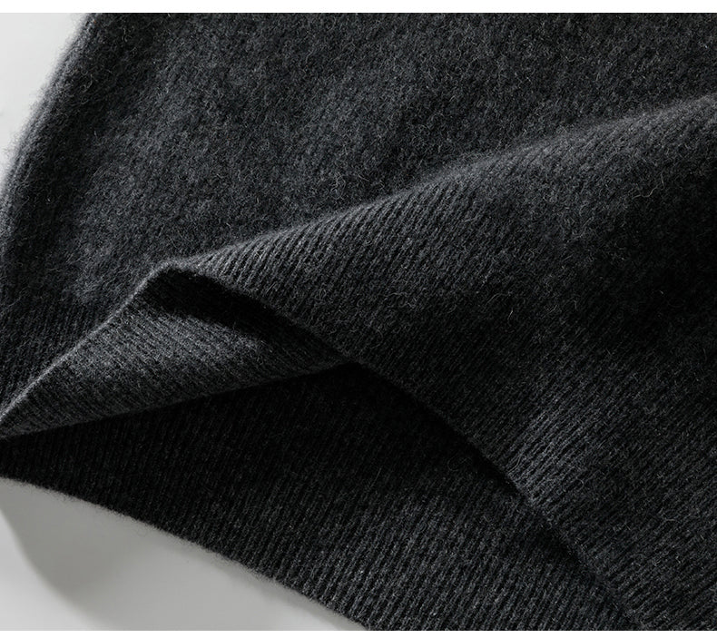 Close-up of dark gray fabric with a textured pattern