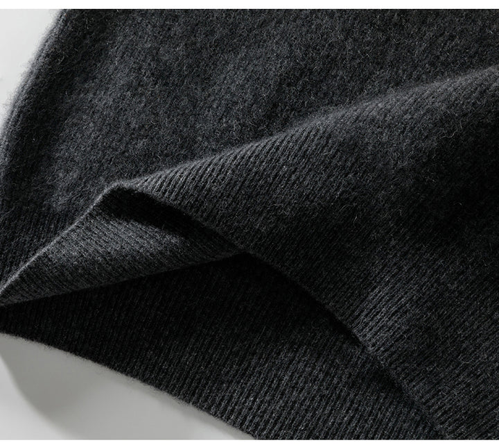 Close-up of dark gray fabric with a textured pattern