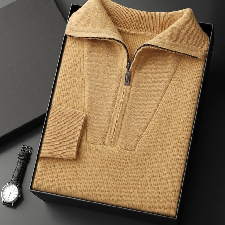 Brown ribbed sweater with a zipper on a black background