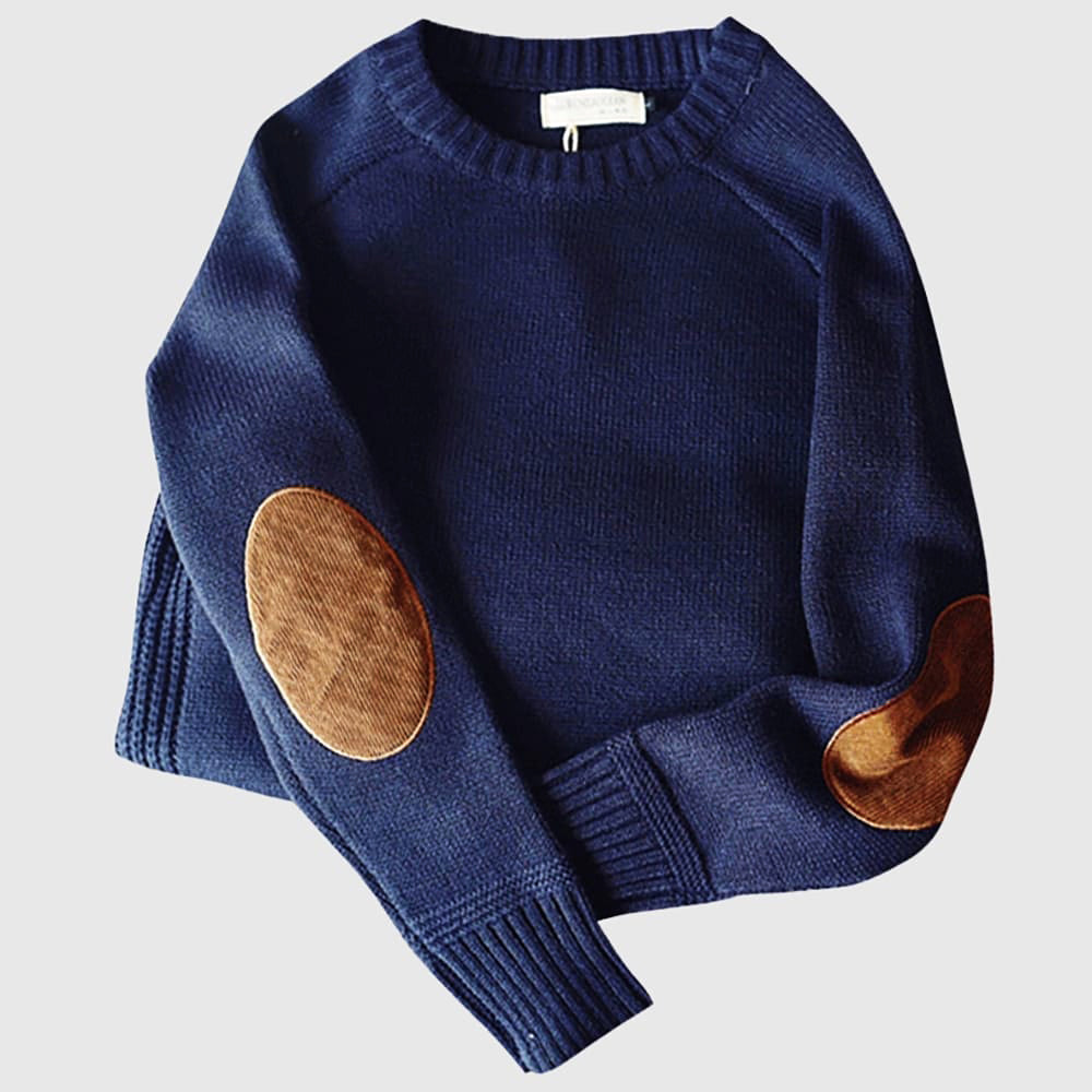 Navy blue sweater with brown elbow patches on a light gray background