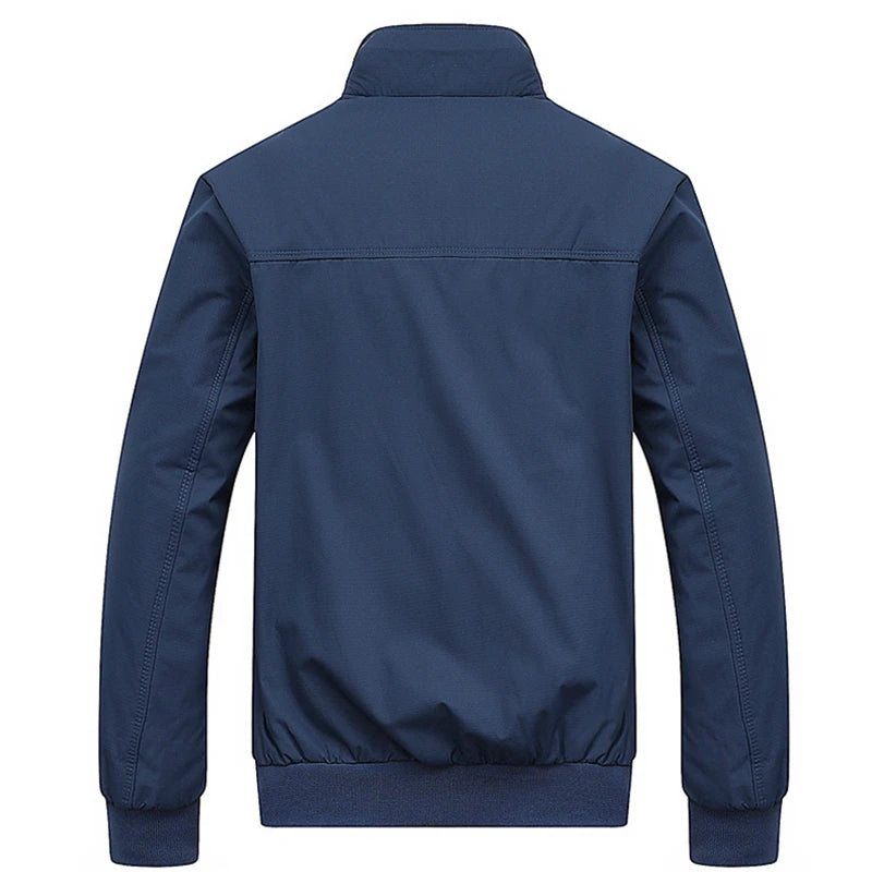 Blue jacket shown from the back on a white background