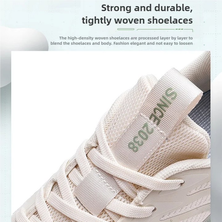 Close-up of a sneaker with beige shoelaces and 'SING' branding on a white background.