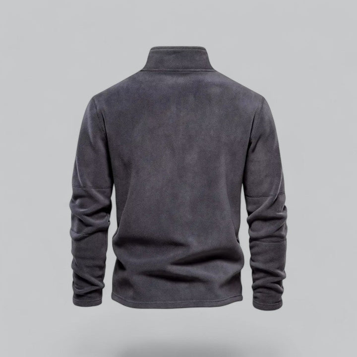 Gray fleece pullover on a gray background