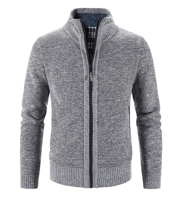 Gray knitted cardigan with a zipper on a white background