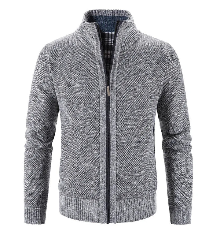 Gray knitted cardigan with a zipper on a white background
