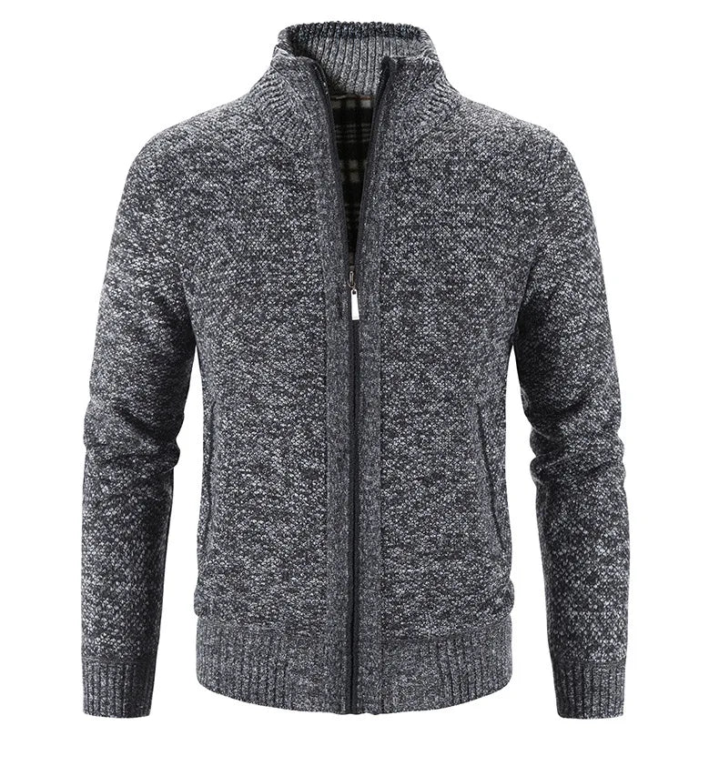 Gray knitted jacket with a zipper on a white background