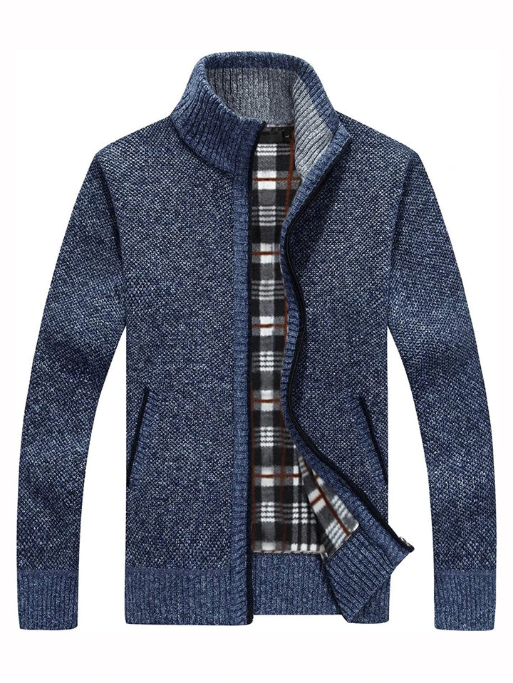 Blue sweater with plaid lining on a white background
