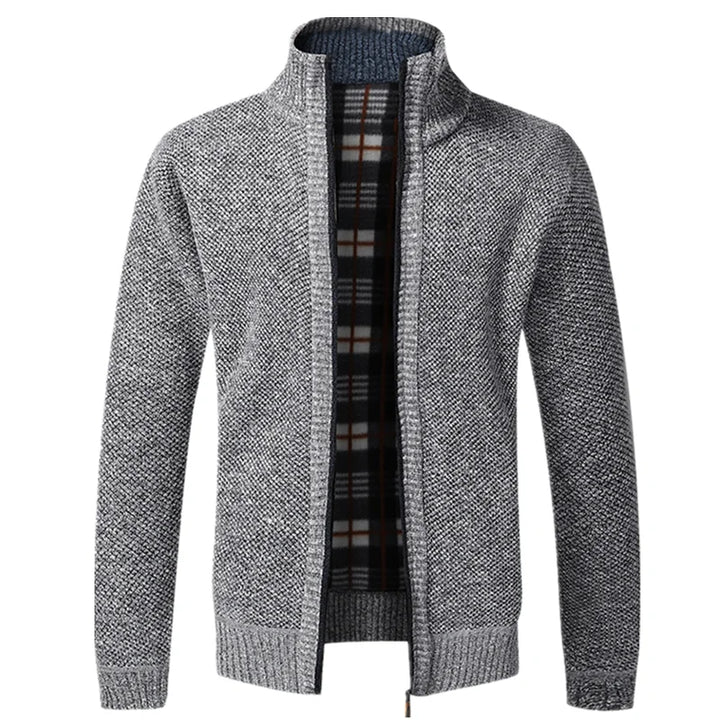 Gray knitted cardigan with plaid lining on a white background