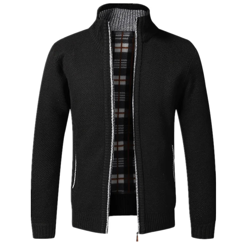Black knit cardigan with plaid lining on a white background