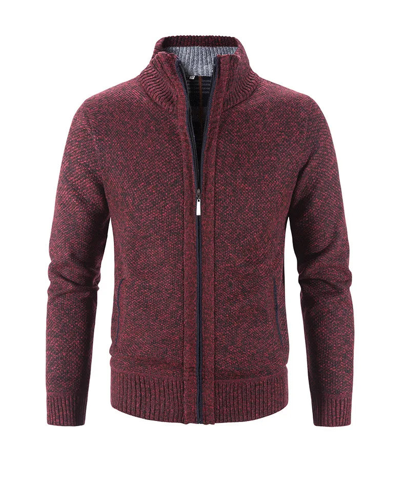 Maroon knitted jacket with a zipper on a white background