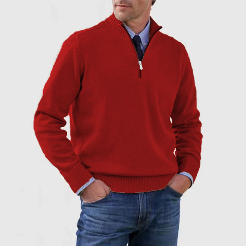 Red sweater worn by a person on a white background